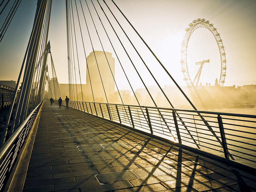 Contemporary Bridge In London At Dawn