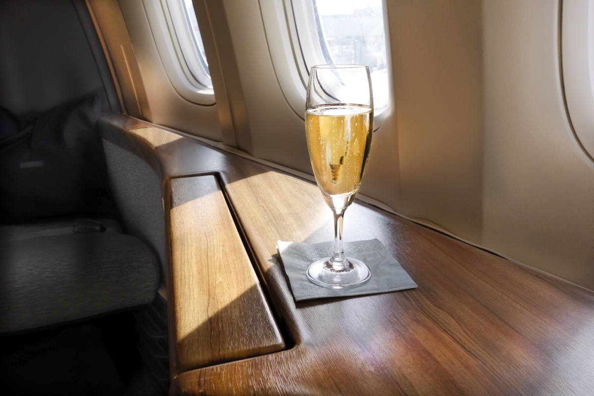 How much champagne is consumed on business class flights?